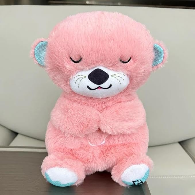 Peluche relajante para bebé que simula respiración ( nutria rosa )